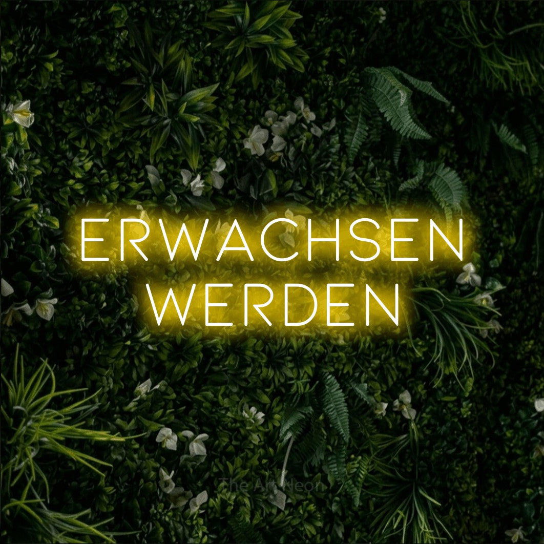 LED neon sign reading “Erwachsen werden”, arranged in 2 lines.