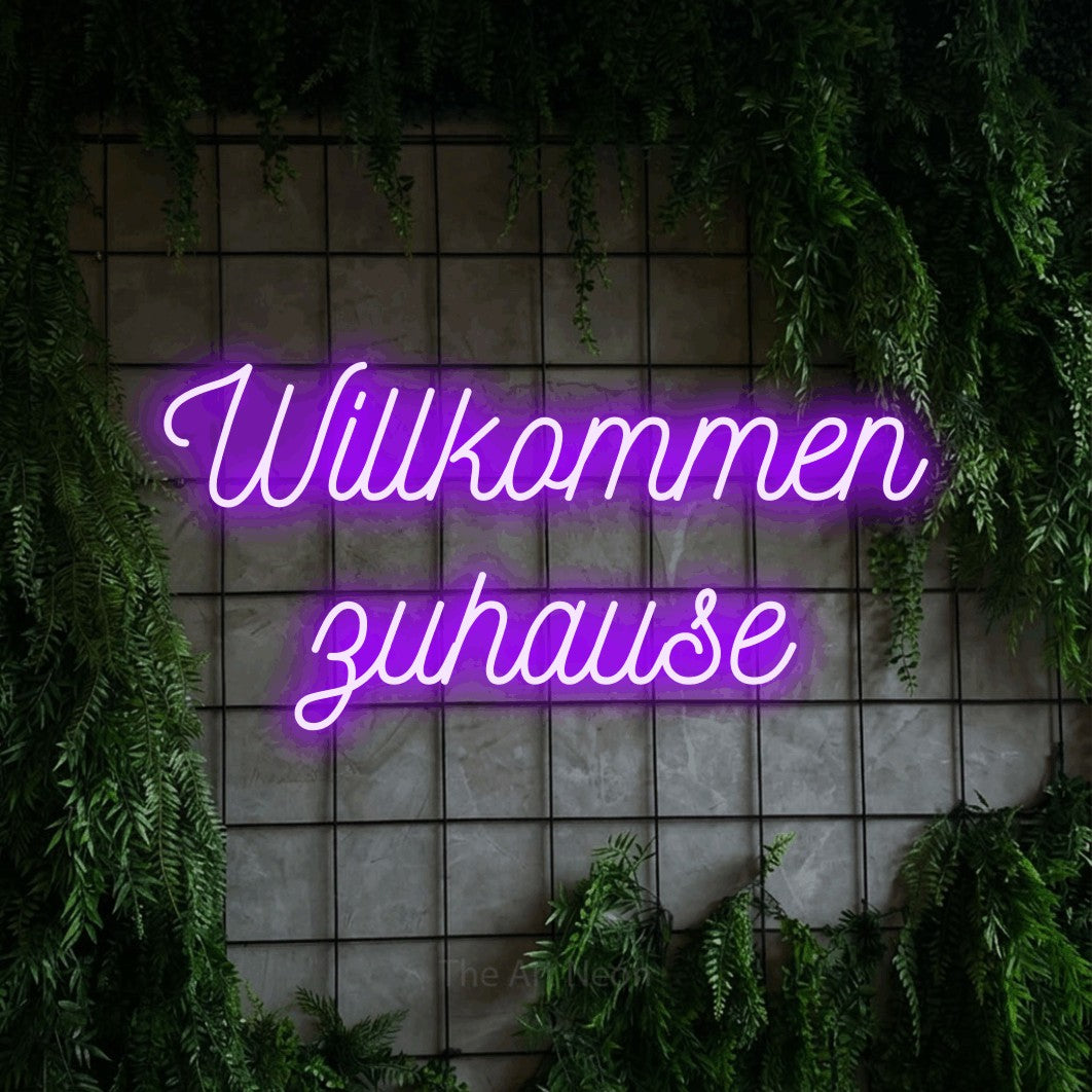 LED neon sign reading “Willkommen zuhause”, arranged in 2 lines.
