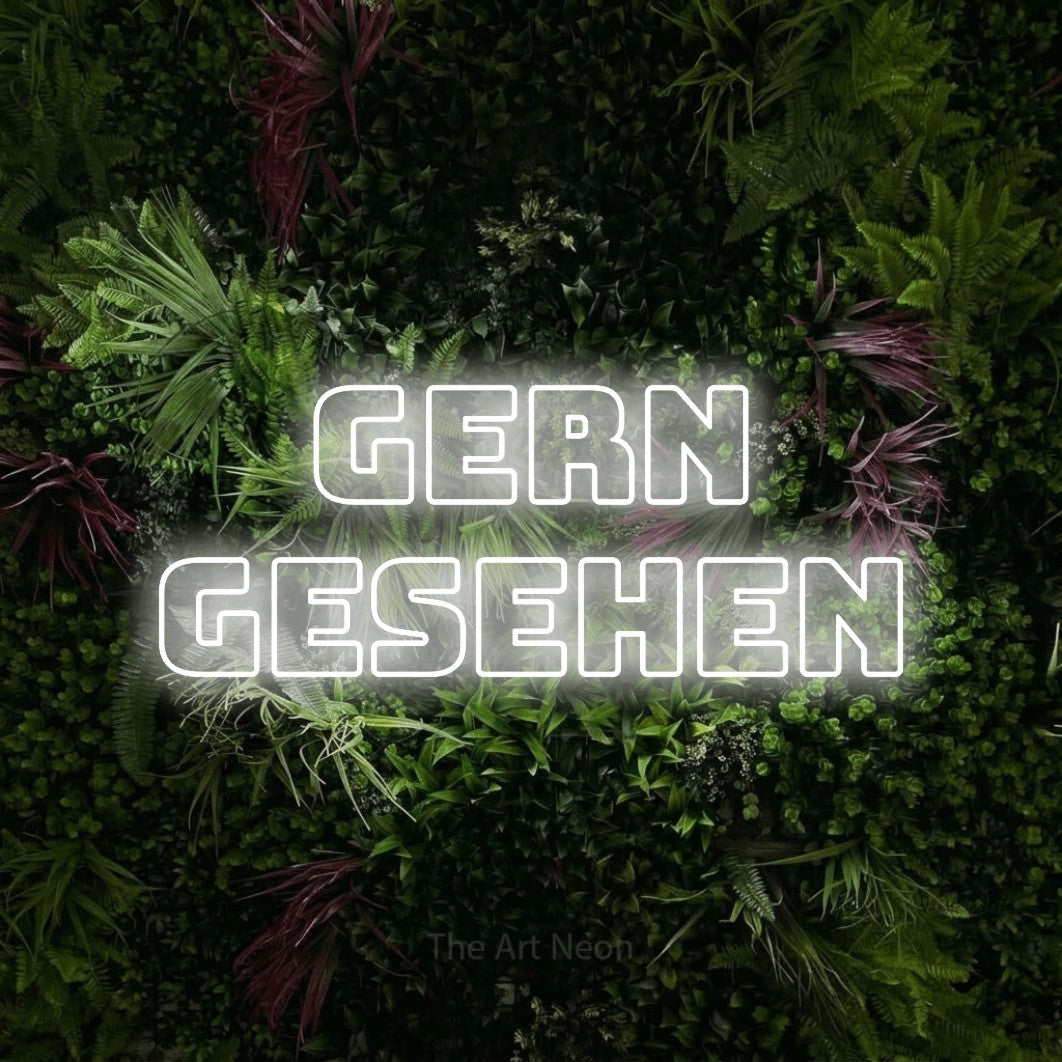 LED neon sign reading “Gern gesehen”, arranged in 2 lines.