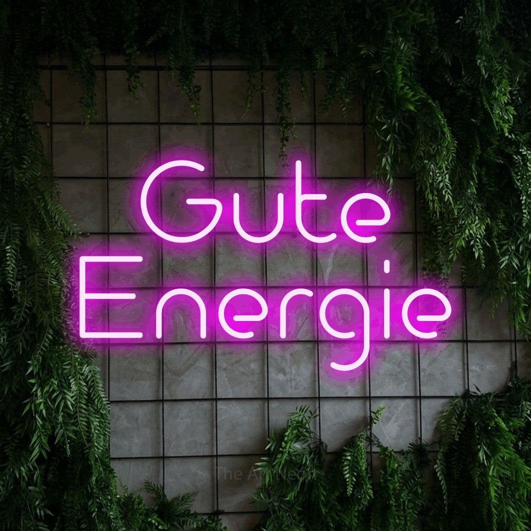 LED neon sign reading “Gute Energie”, arranged in 2 lines.