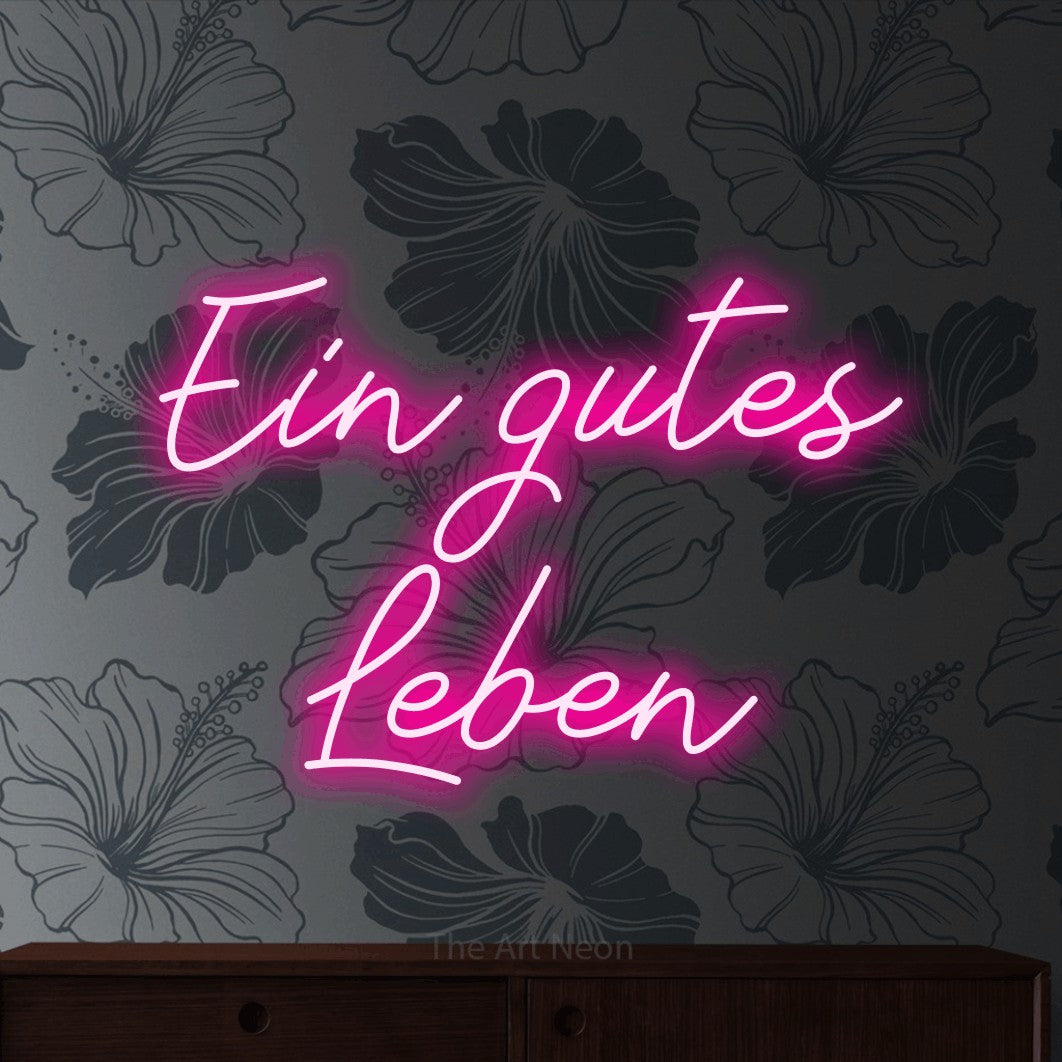 LED neon sign reading “Ein gutes Leben”, arranged in 2 lines.