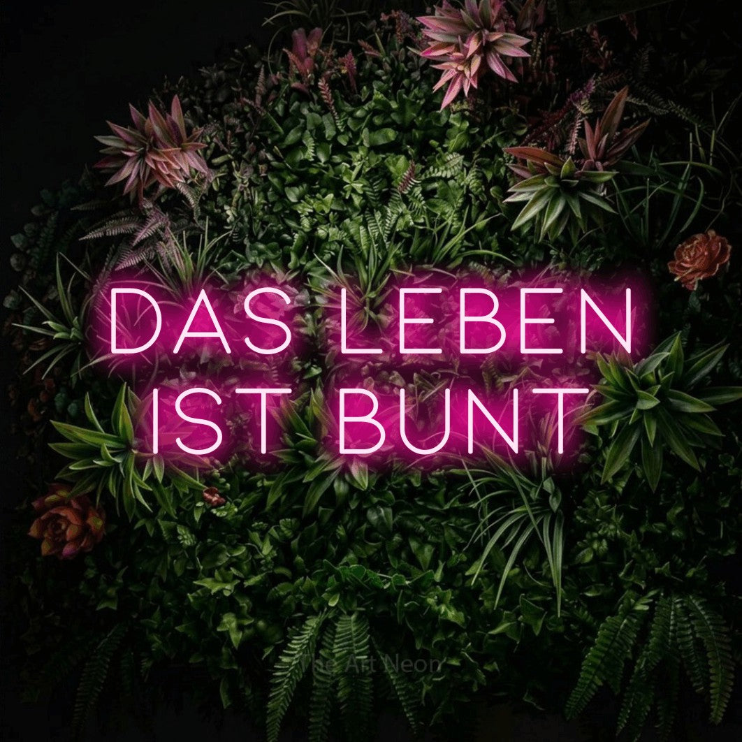 LED neon sign reading “Das Leben ist bunt”, arranged in 2 lines.