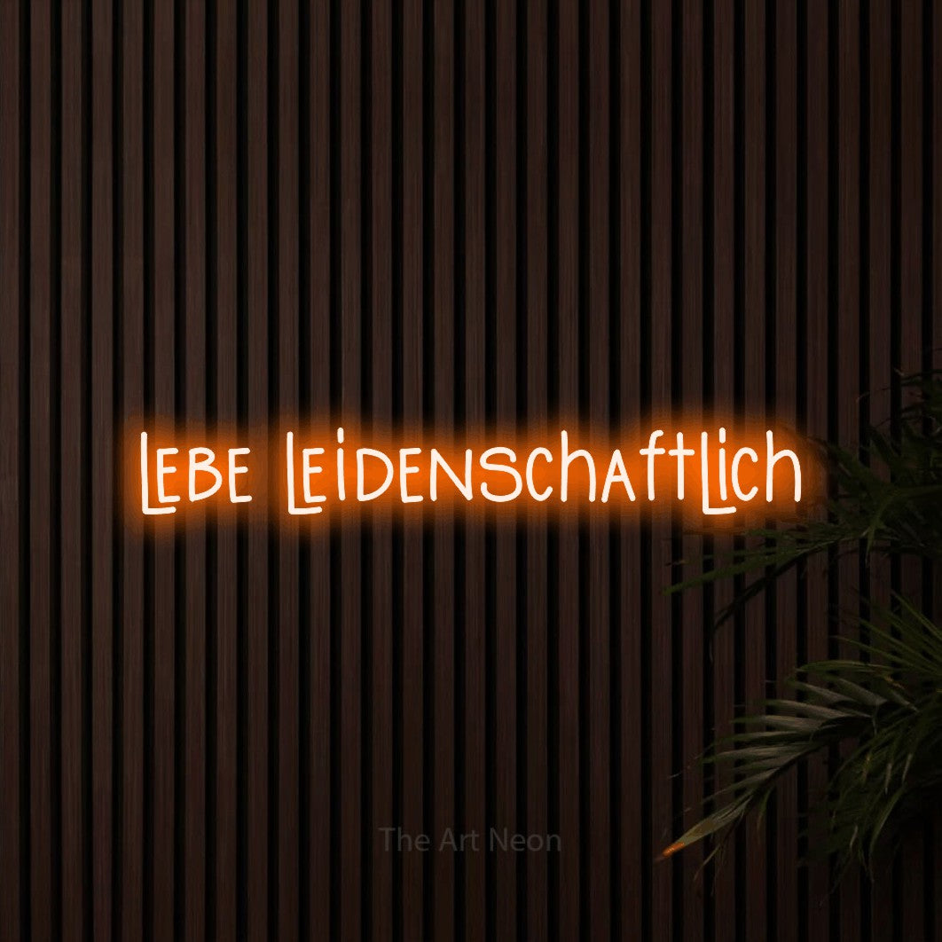 LED neon sign reading “lebe leidenschaftlich”, arranged in a single line.