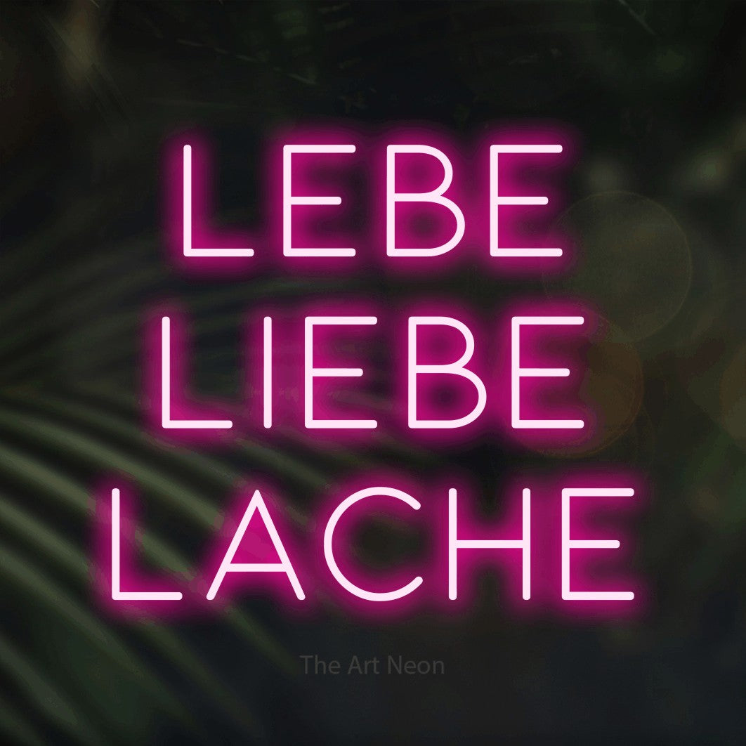 LED neon sign reading “Lebe liebe lache”, arranged in 3 lines.