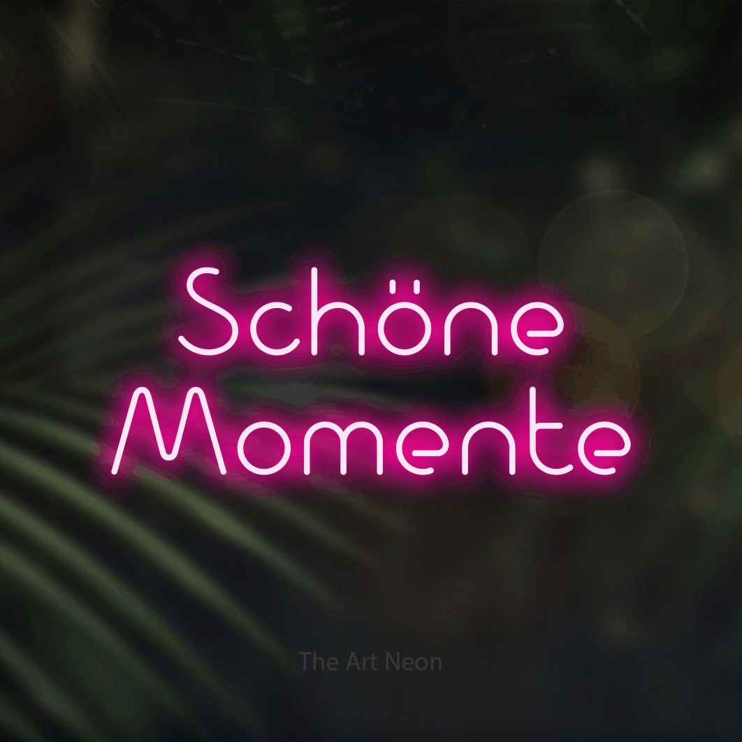 LED neon sign reading “Schöne Momente”, arranged in 2 lines.