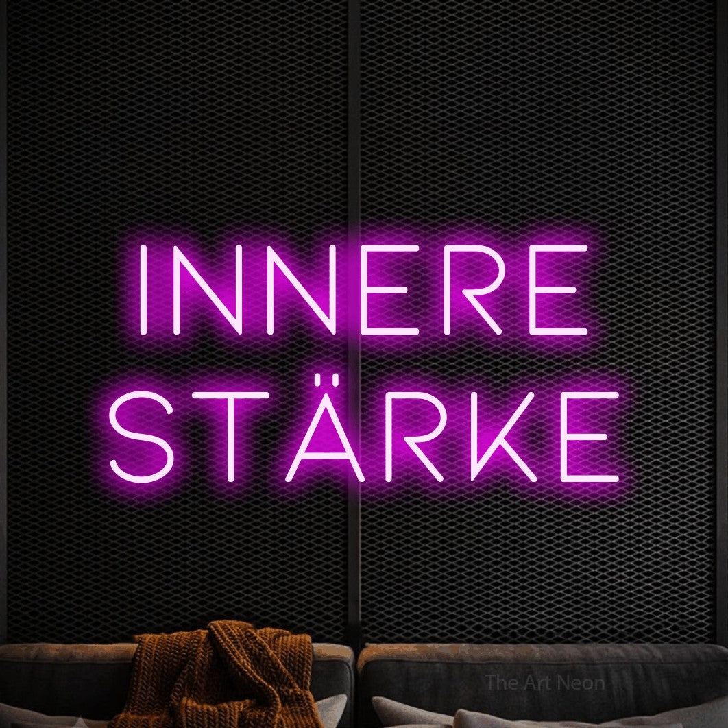 LED neon sign reading “Innere Stärke”, arranged in 2 lines.