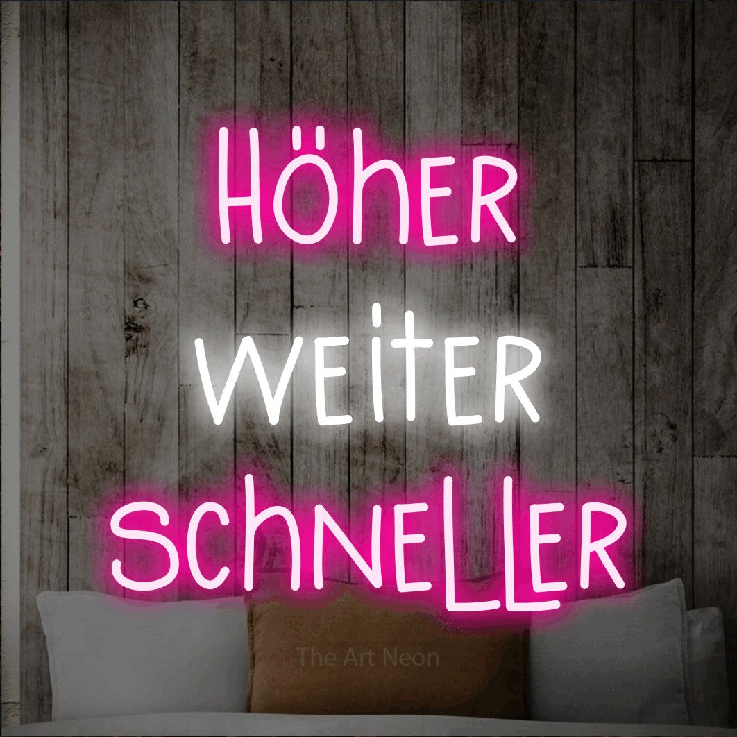 LED neon sign reading “Höher weiter schneller”, arranged in 3 lines.