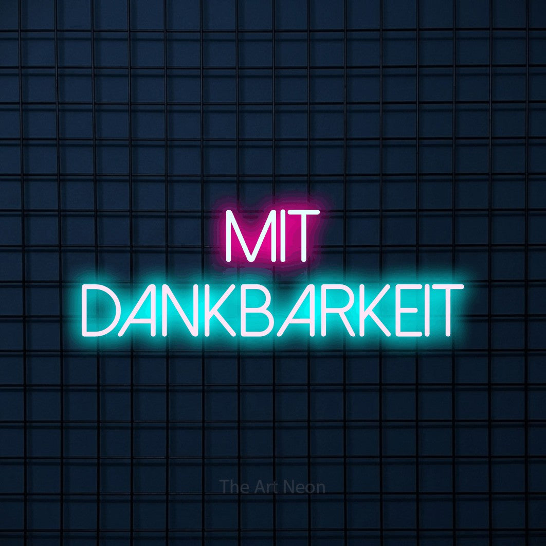 LED neon sign reading “mit dankbarkeit”, arranged in 2 lines.