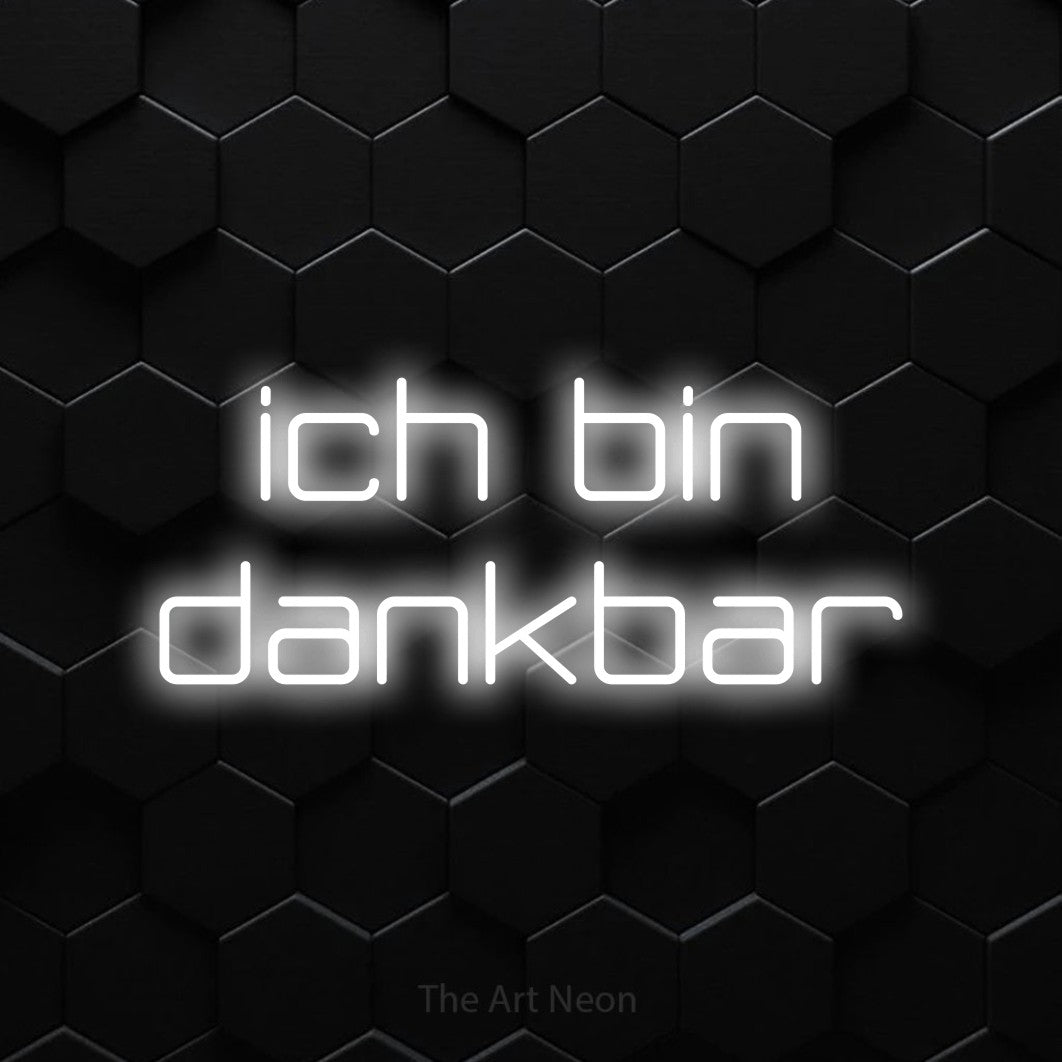LED neon sign reading “ich bin dankbar”, arranged in 2 lines.