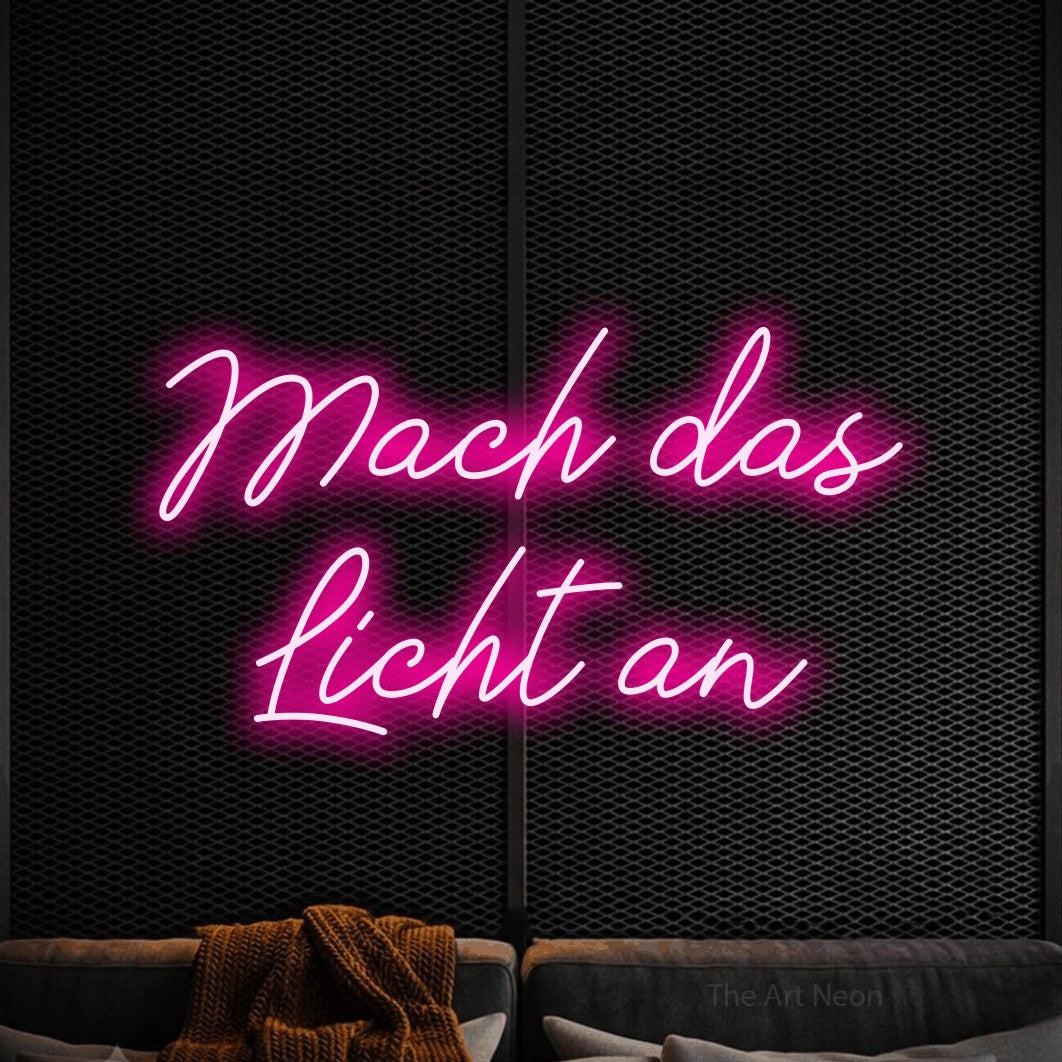 LED neon sign reading “Mach das Licht an”, arranged in 2 lines.