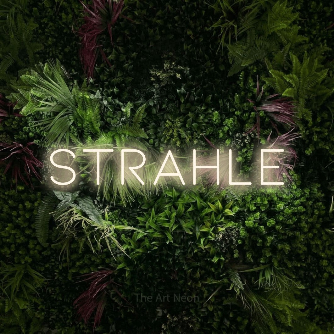 LED neon sign reading “Strahle”, arranged in a single line.