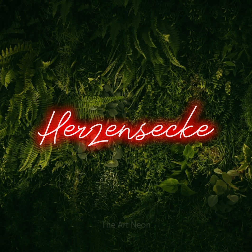 LED neon sign reading “Herzensecke”, arranged in a single line.