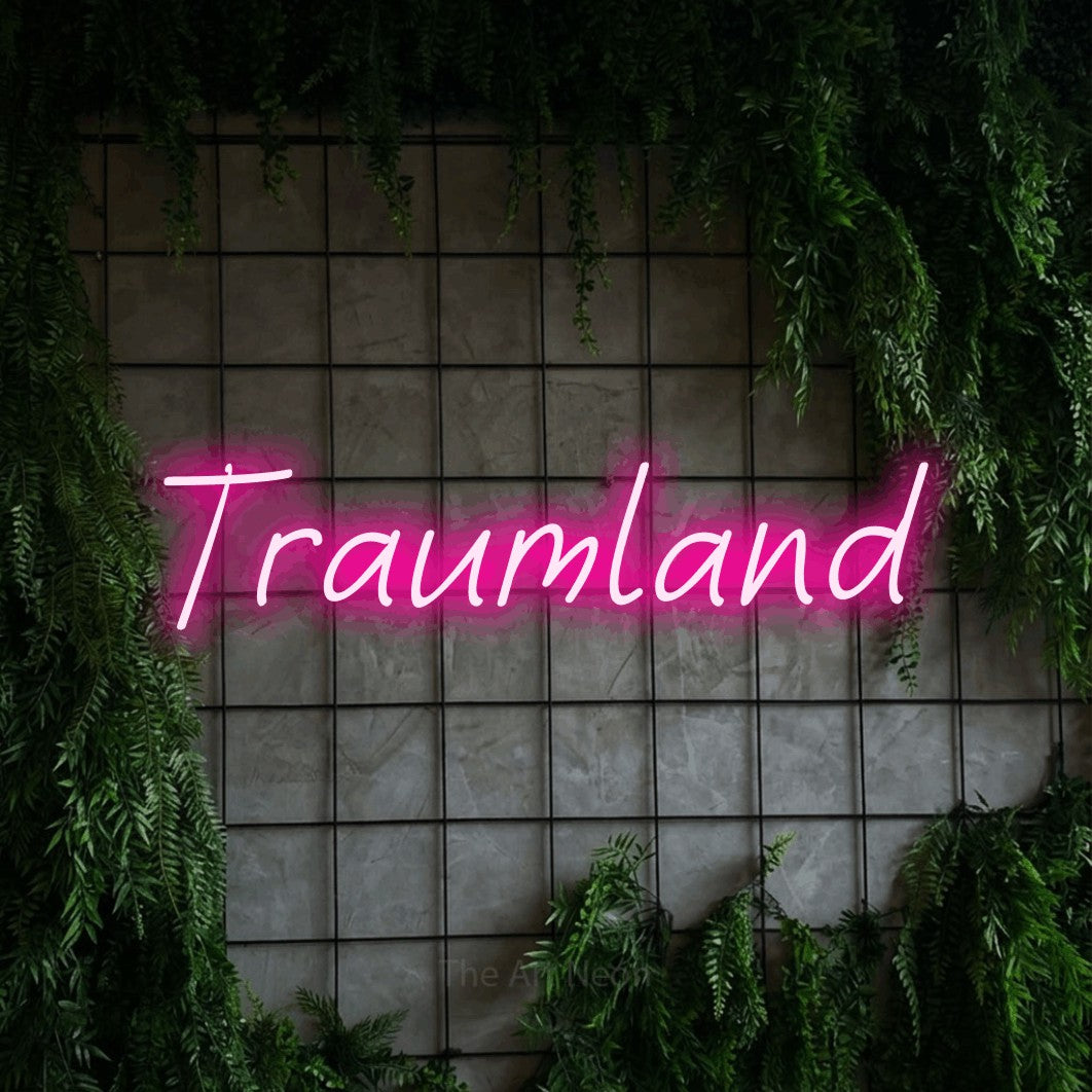 LED neon sign reading “Traumland”, arranged in a single line.