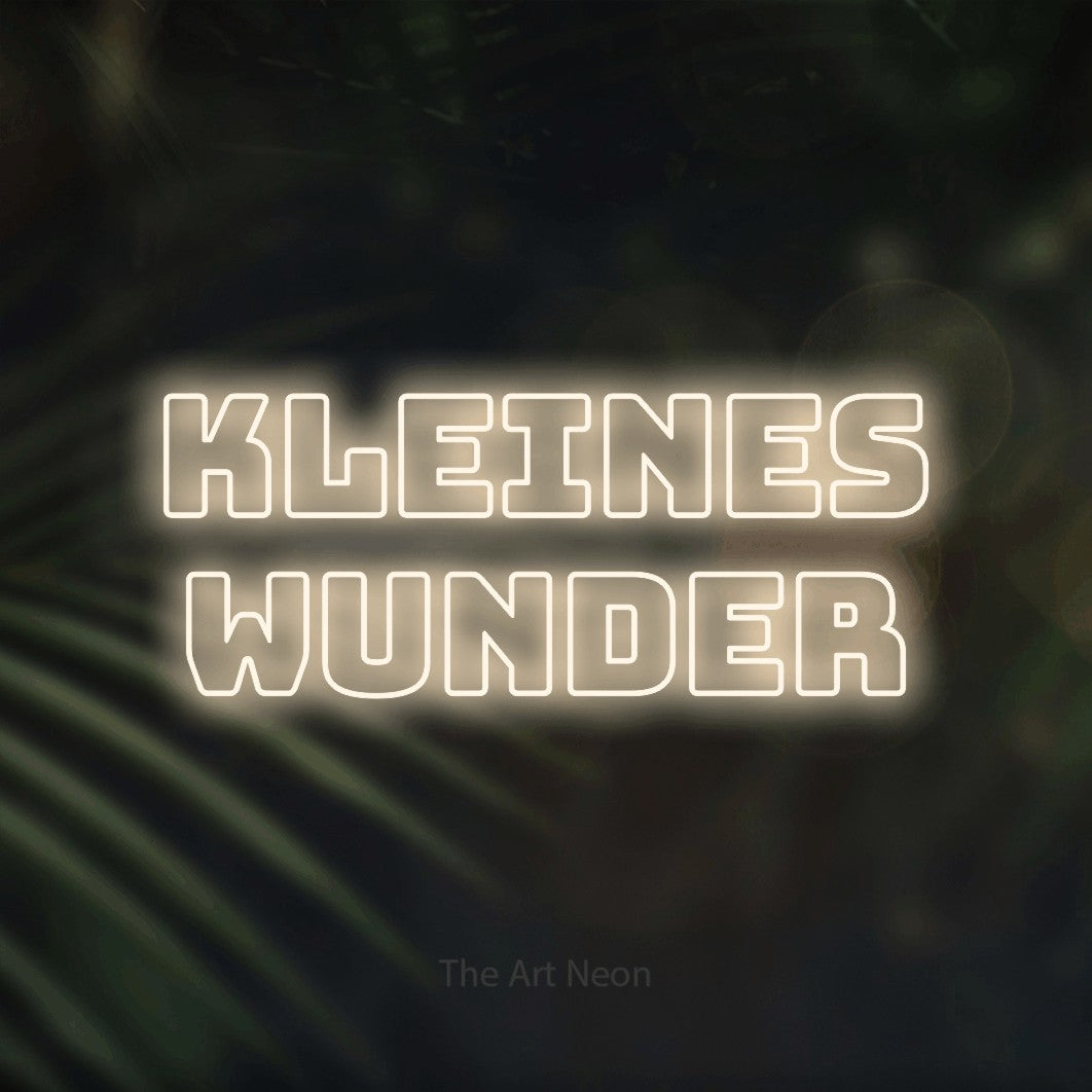 LED neon sign reading “KLEINES WUNDER”, arranged in 2 lines.
