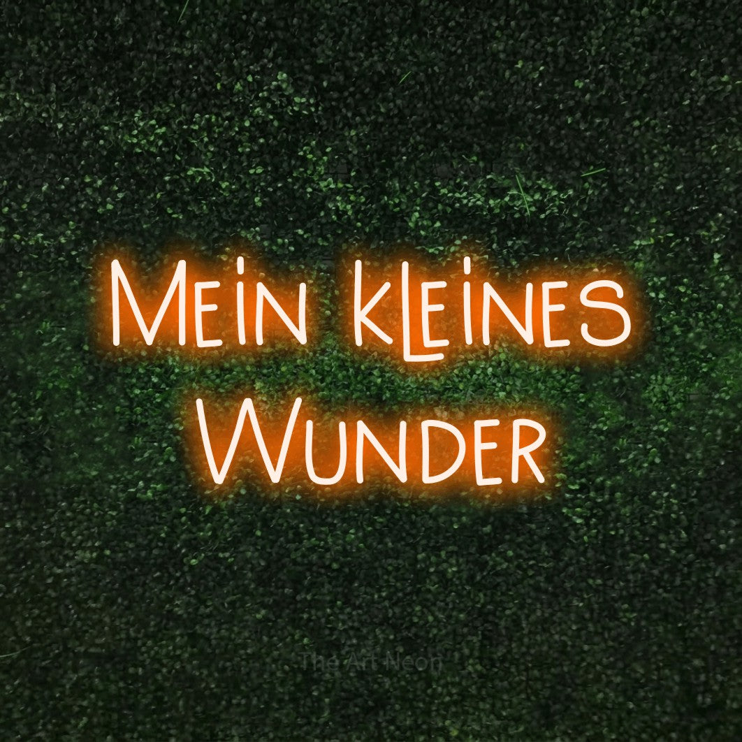 LED neon sign reading “Mein kleines Wunder”, arranged in 2 lines.