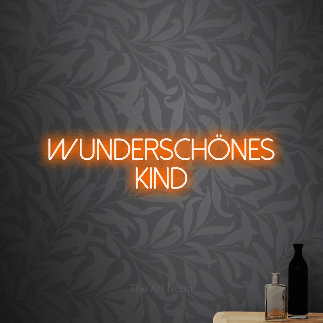 LED neon sign reading “wunderschönes kind”, arranged in 2 lines.