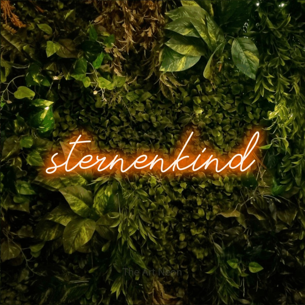 LED neon sign reading “sternenkind”, arranged in a single line.