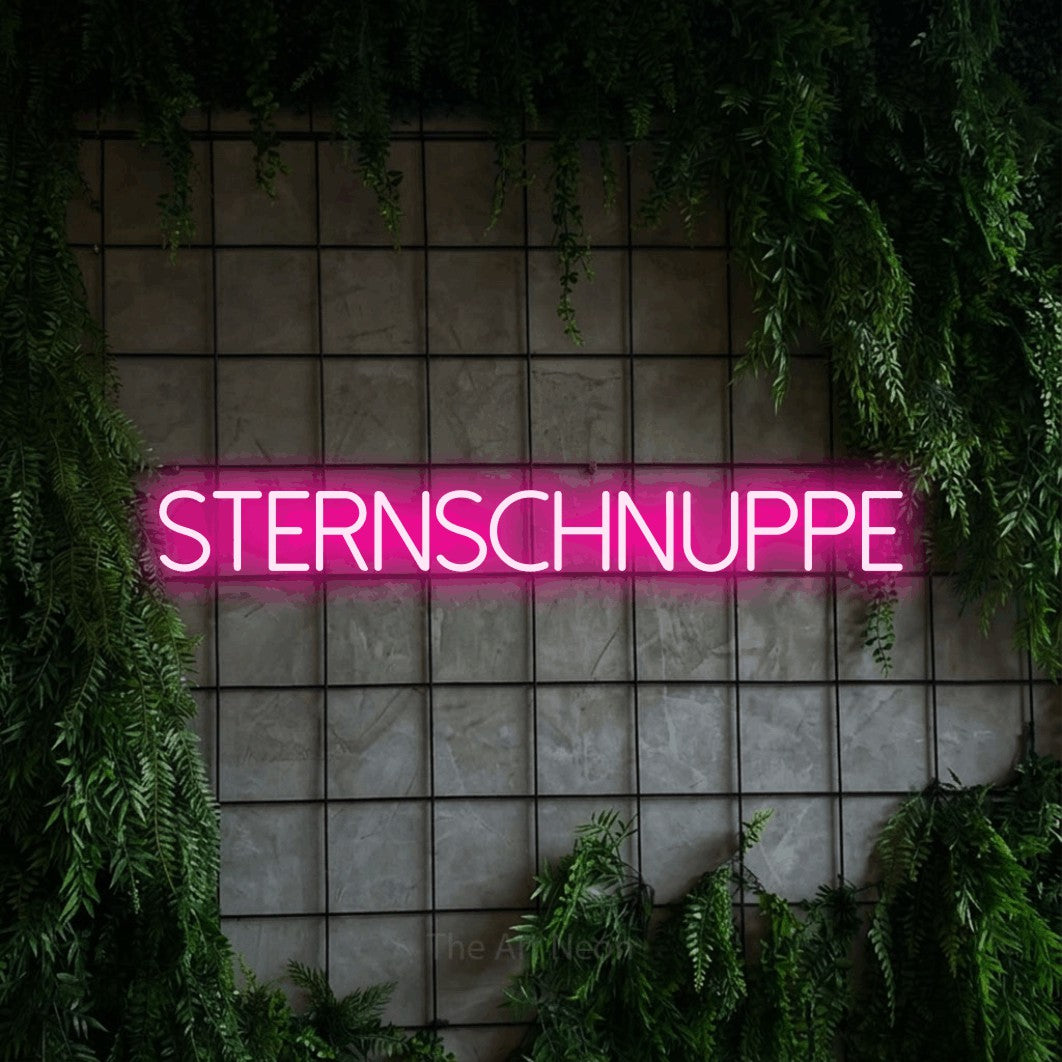 LED neon sign reading “STERNSCHNUPPE”, arranged in a single line.
