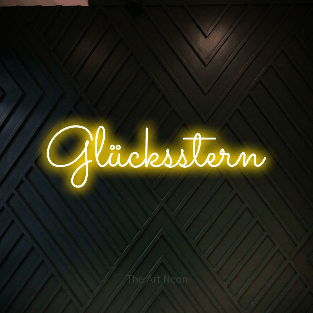 LED neon sign reading “Glücksstern”, arranged in a single line.