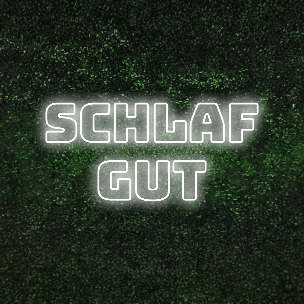 LED neon sign reading “Schlaf gut”, arranged in 2 lines.