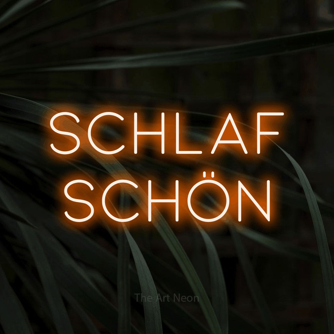 LED neon sign reading “Schlaf schön”, arranged in 2 lines.