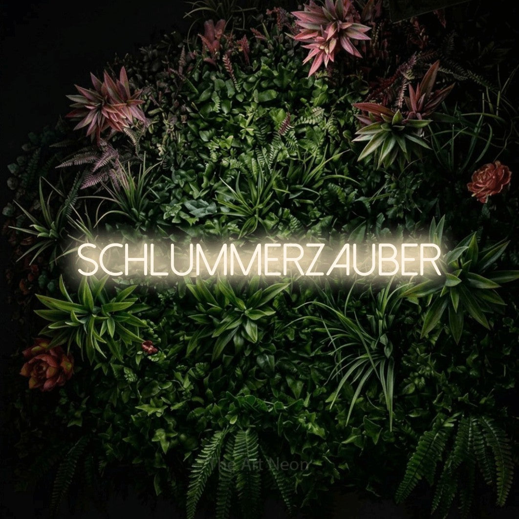 LED neon sign reading “schlummerzauber”, arranged in a single line.