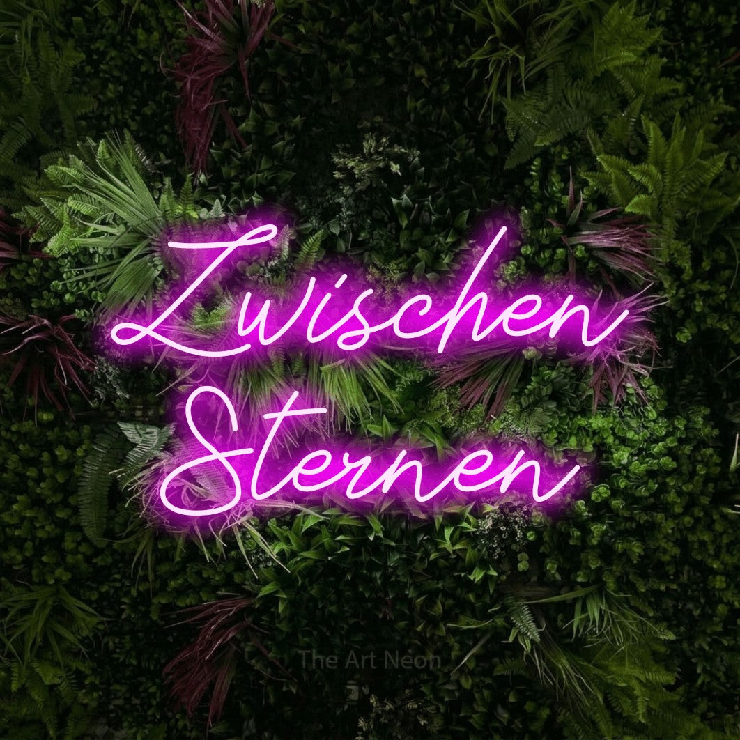 LED neon sign reading “Zwischen Sternen”, arranged in 2 lines.