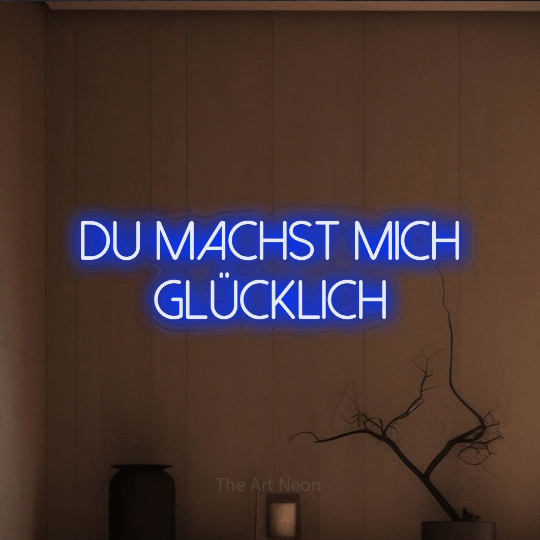 LED neon sign reading “du machst mich glücklich”, arranged in 2 lines.