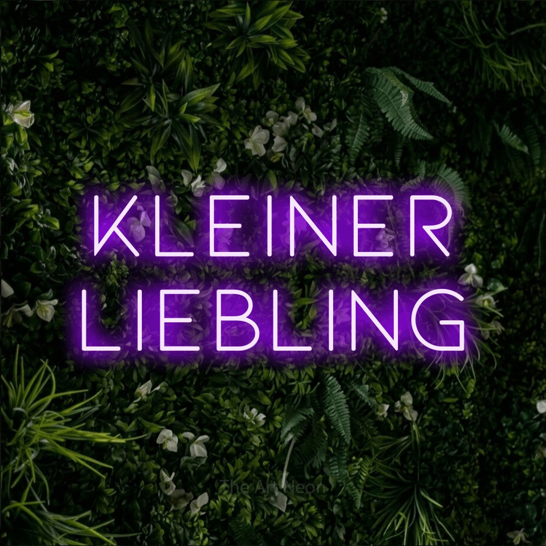 LED neon sign reading “Kleiner Liebling”, arranged in 2 lines.