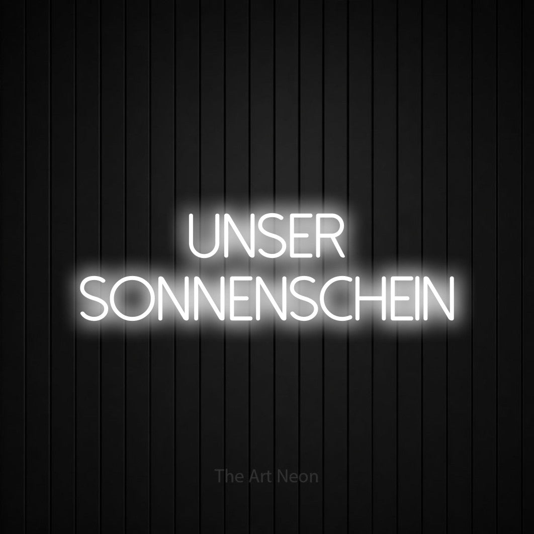 LED neon sign reading “unser sonnenschein”, arranged in 2 lines.