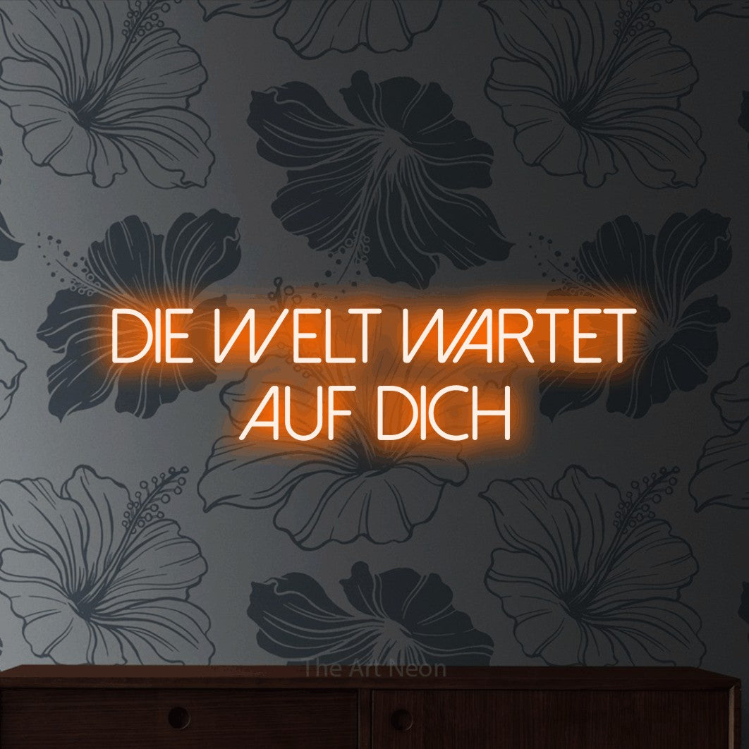 LED neon sign reading “Die Welt wartet auf dich”, arranged in 2 lines.