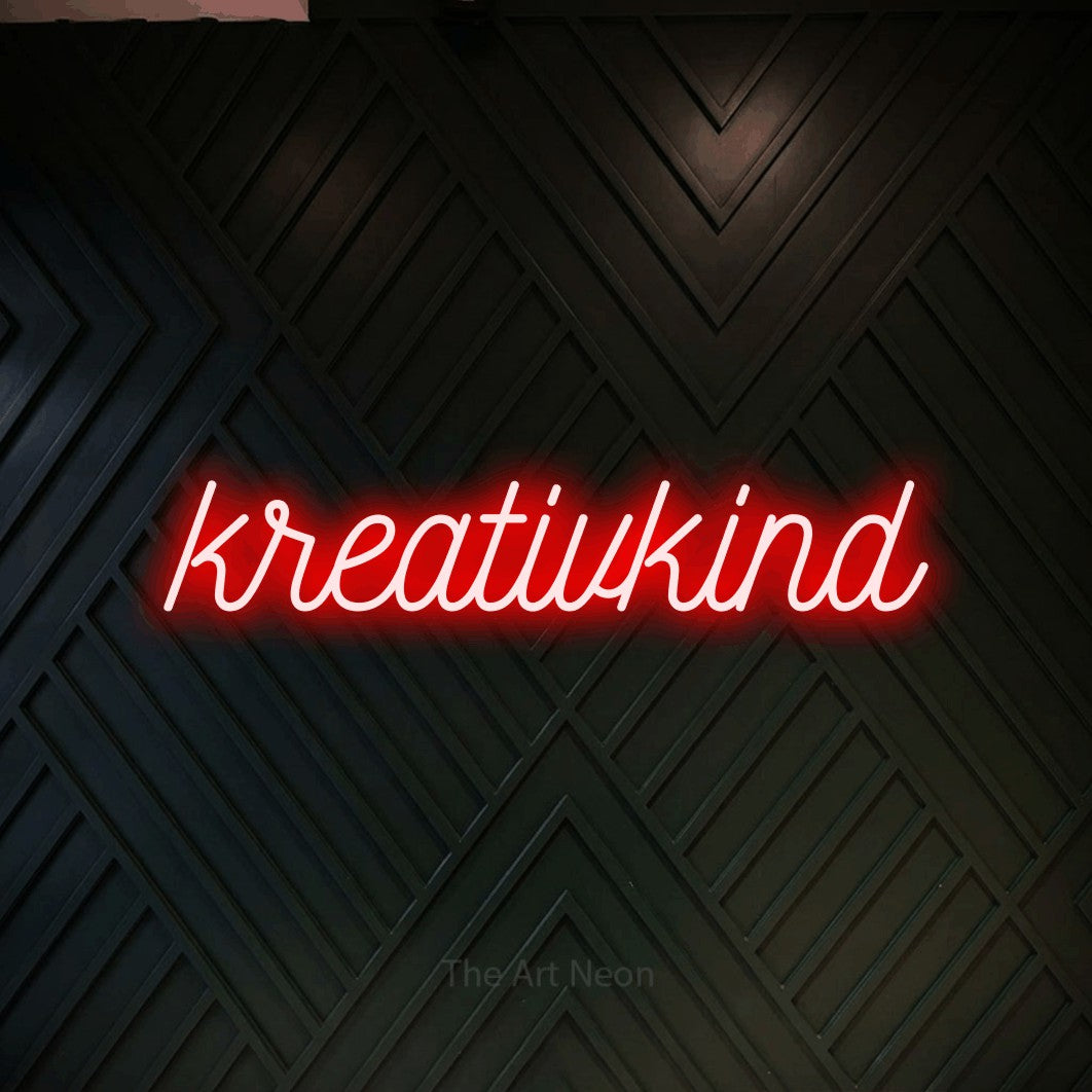LED neon sign reading “kreativkind”, arranged in a single line.