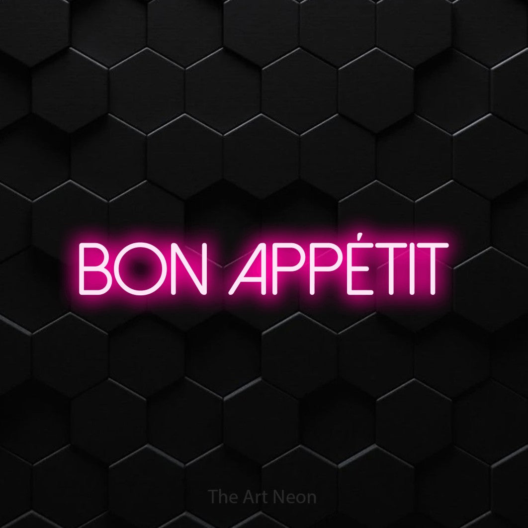 LED neon sign reading “Bon appétit”, arranged in a single line.