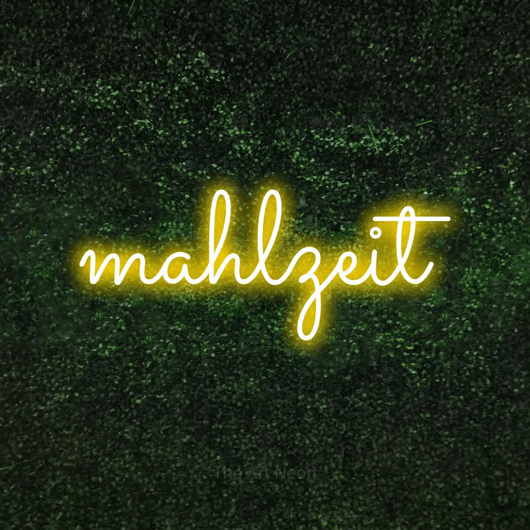LED neon sign reading “mahlzeit”, arranged in a single line.
