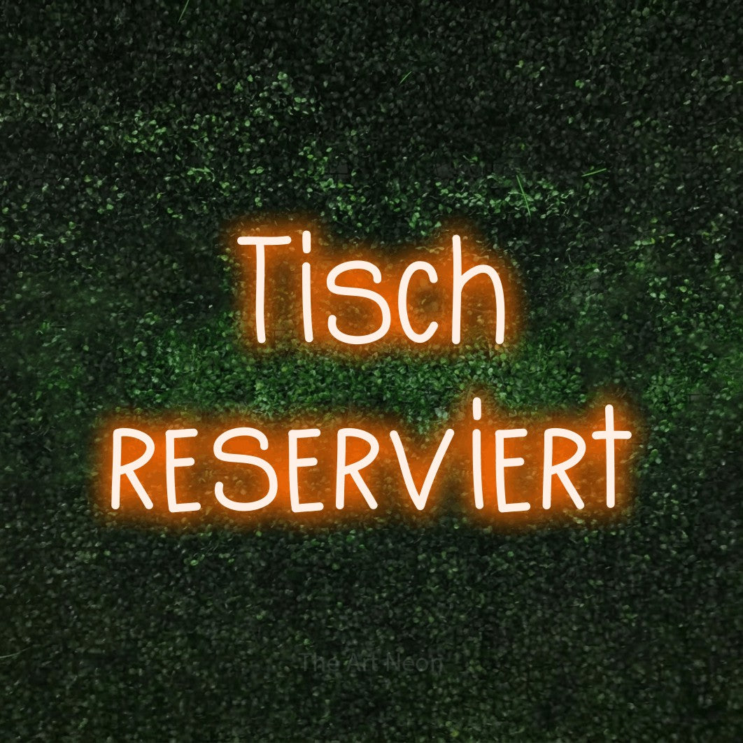 LED neon sign reading “Tisch reserviert”, arranged in 2 lines.