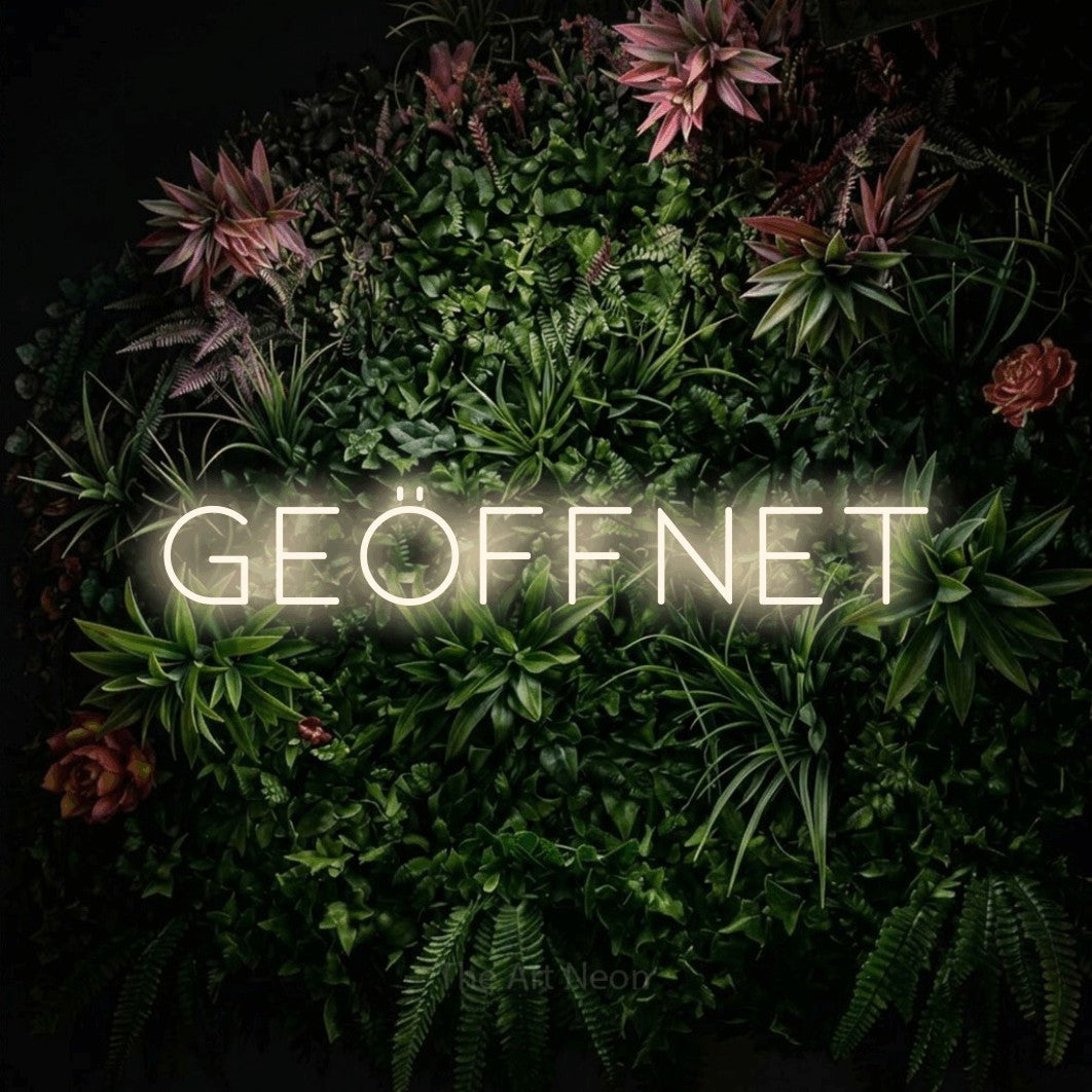 LED neon sign reading “Geöffnet”, arranged in a single line.
