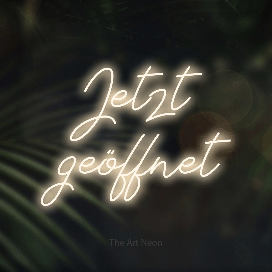LED neon sign reading “Jetzt geöffnet”, arranged in 2 lines.