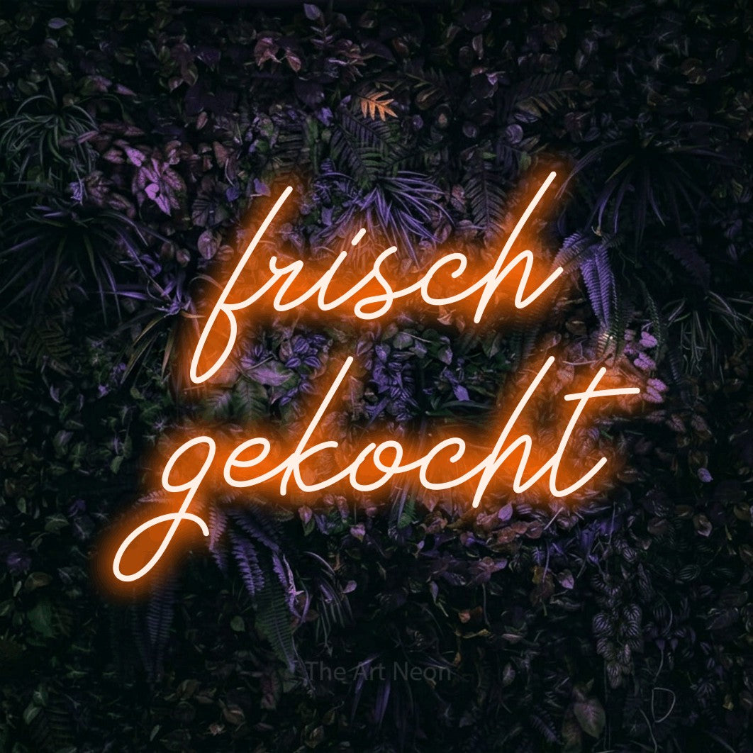 LED neon sign reading “frisch gekocht”, arranged in 2 lines.