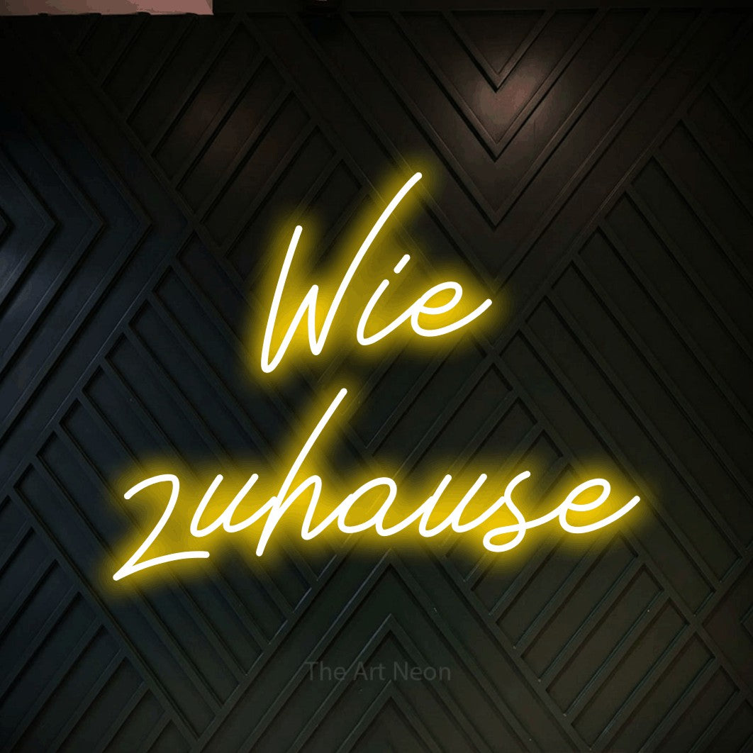 LED neon sign reading “Wie zuhause”, arranged in 2 lines.