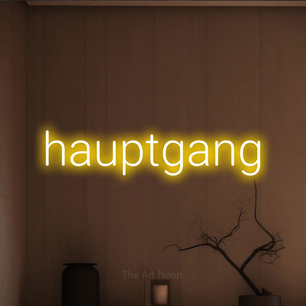 LED neon sign reading “hauptgang”, arranged in a single line.