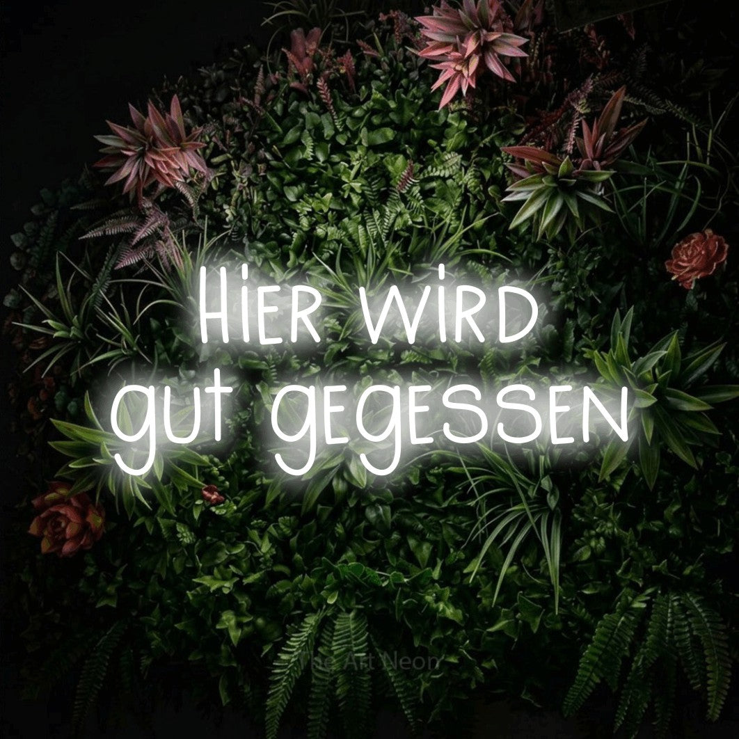 LED neon sign reading “Hier wird gut gegessen”, arranged in 2 lines.