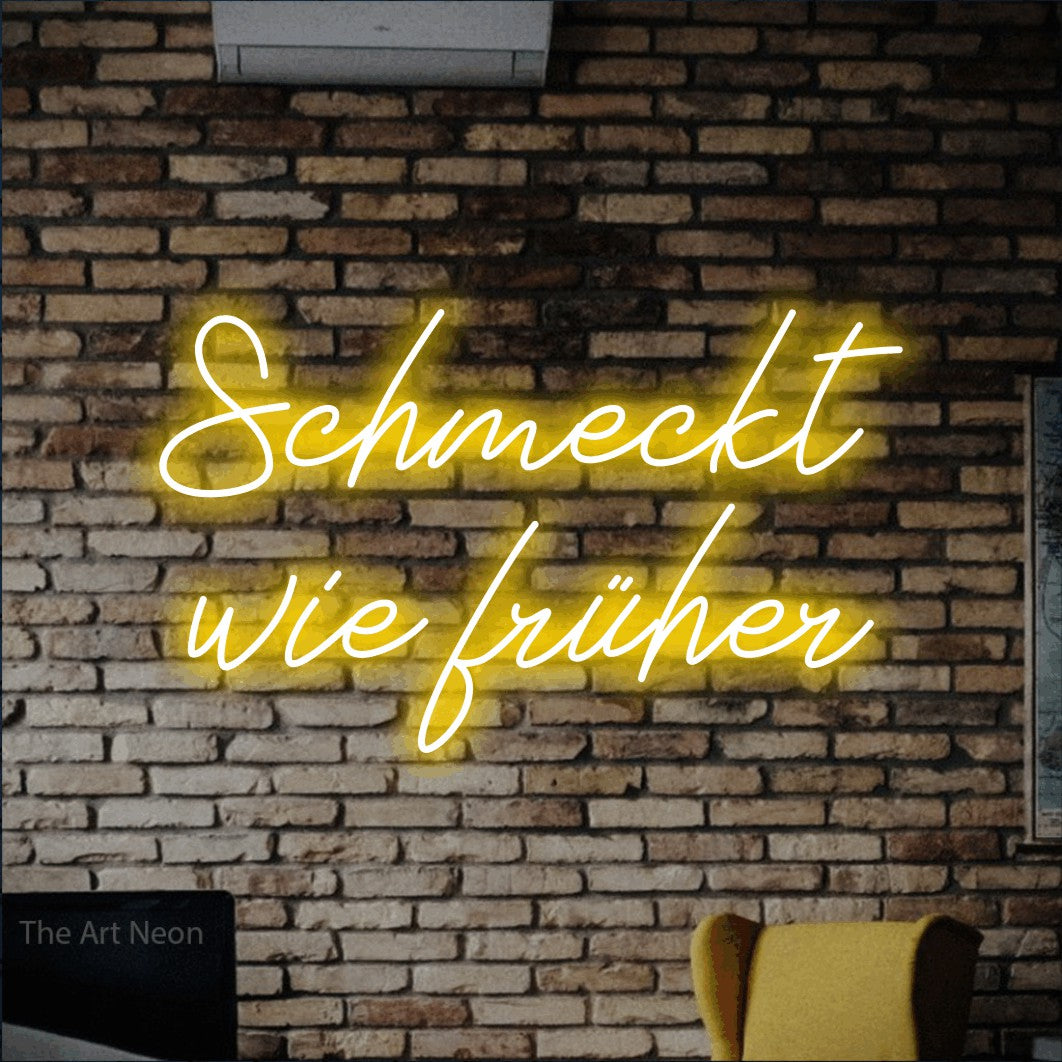 LED neon sign reading “Schmeckt wie früher”, arranged in 2 lines.