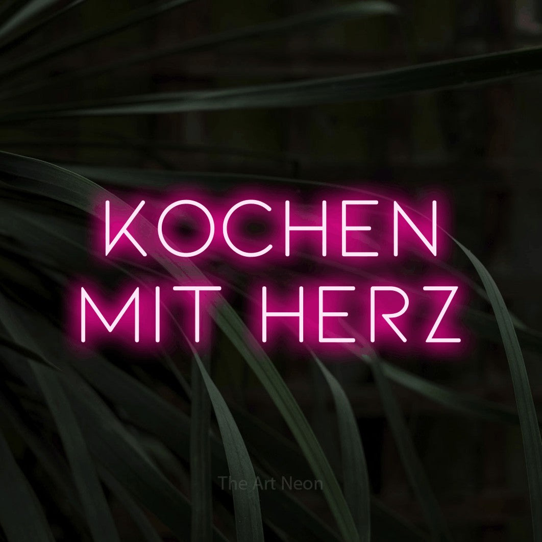 LED neon sign reading “KOCHEN MIT HERZ”, arranged in 2 lines.