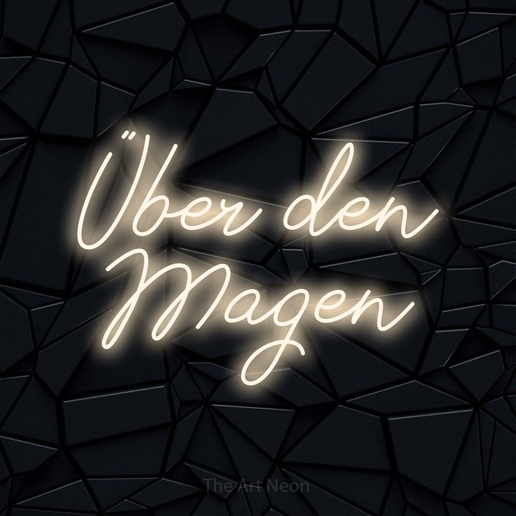 LED neon sign reading “Über den Magen”, arranged in 2 lines.
