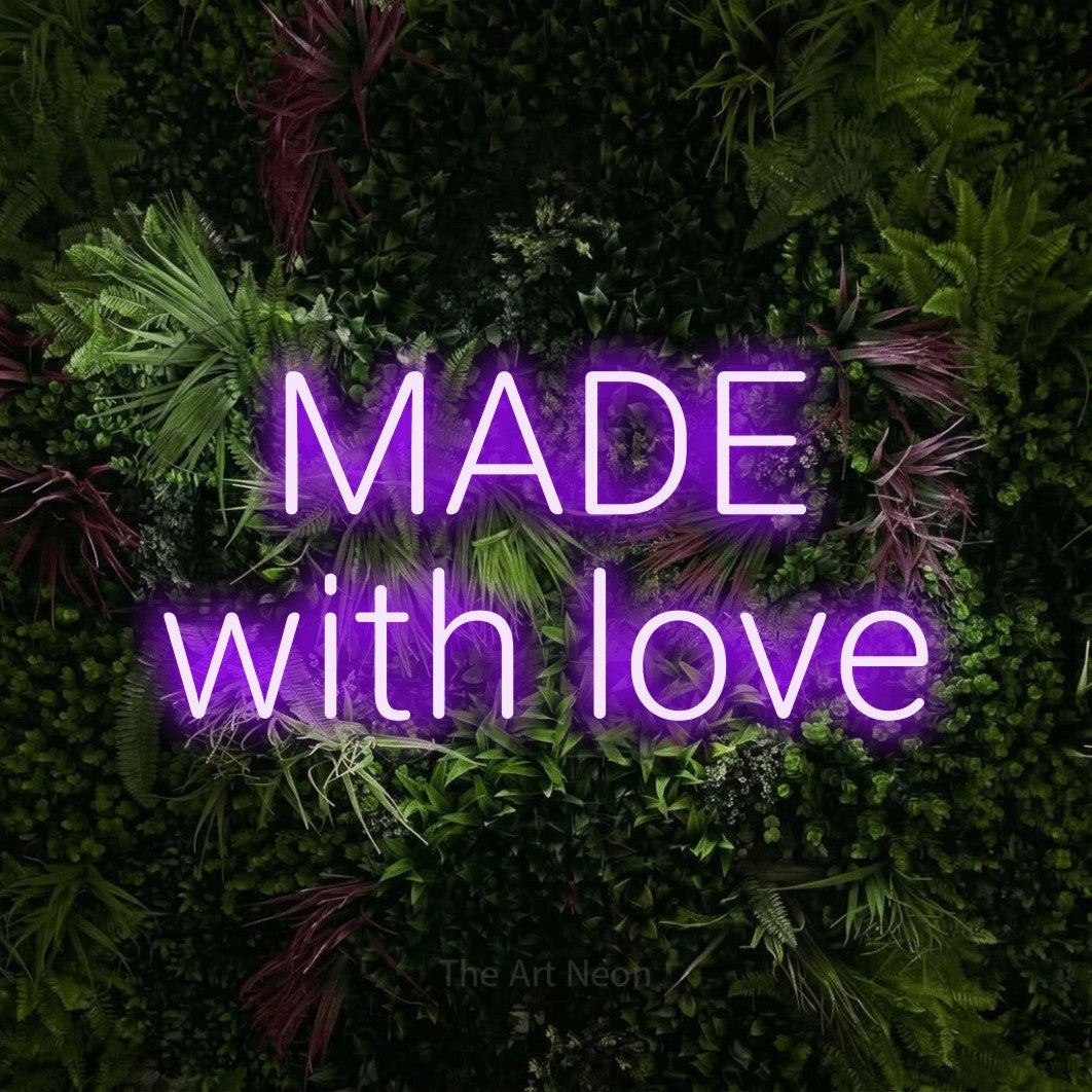 LED neon sign reading “MADE with love”, arranged in 2 lines.