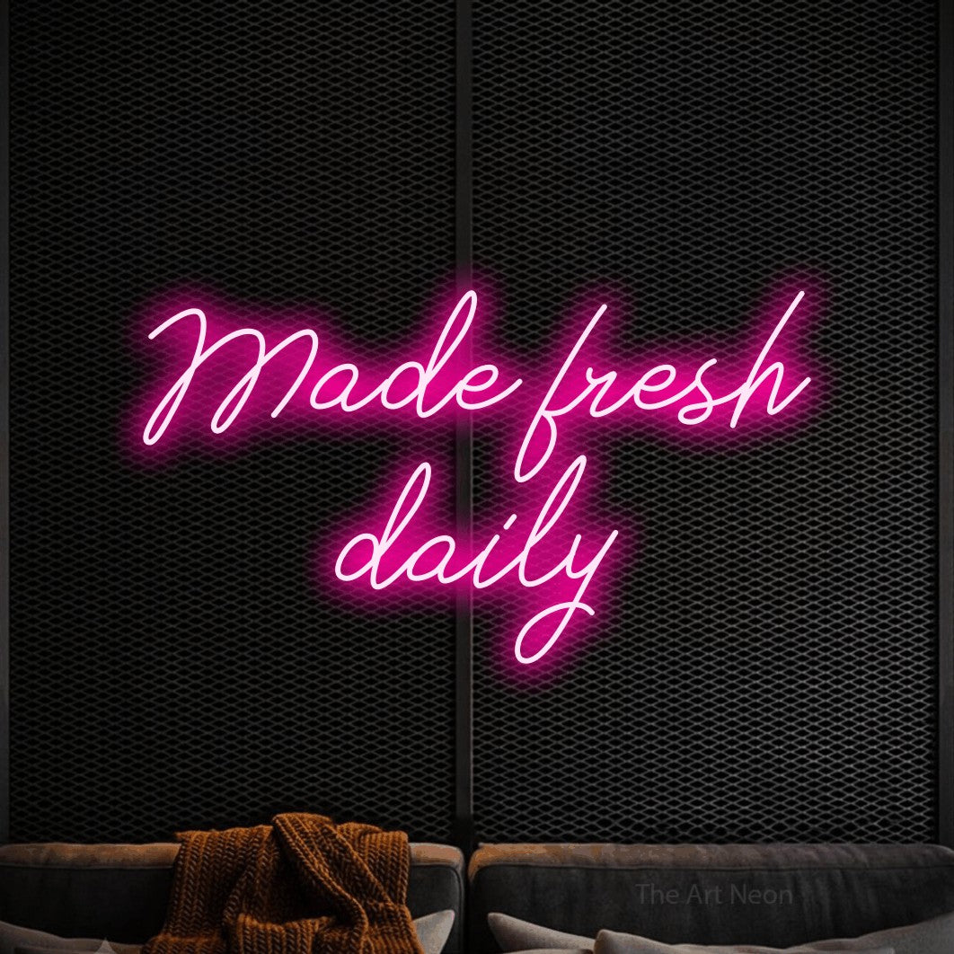 LED neon sign reading “Made fresh daily”, arranged in 2 lines.