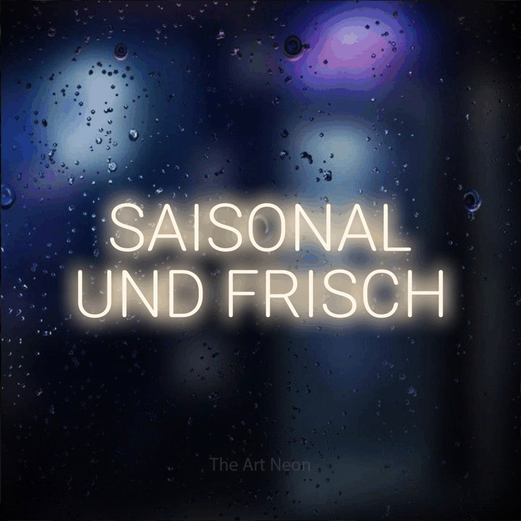 LED neon sign reading “SAISONAL UND FRISCH”, arranged in 2 lines.