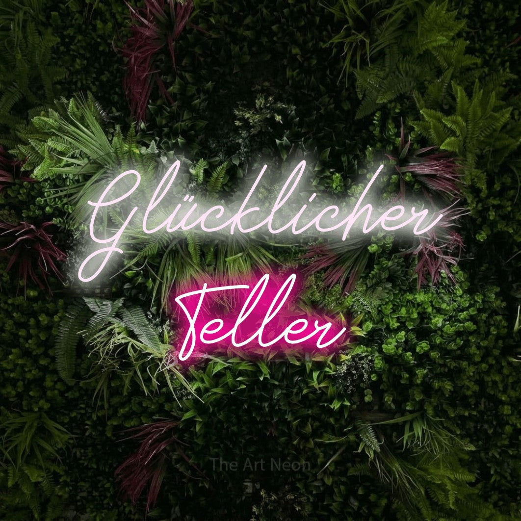 LED neon sign reading “Glücklicher Teller”, arranged in 2 lines.