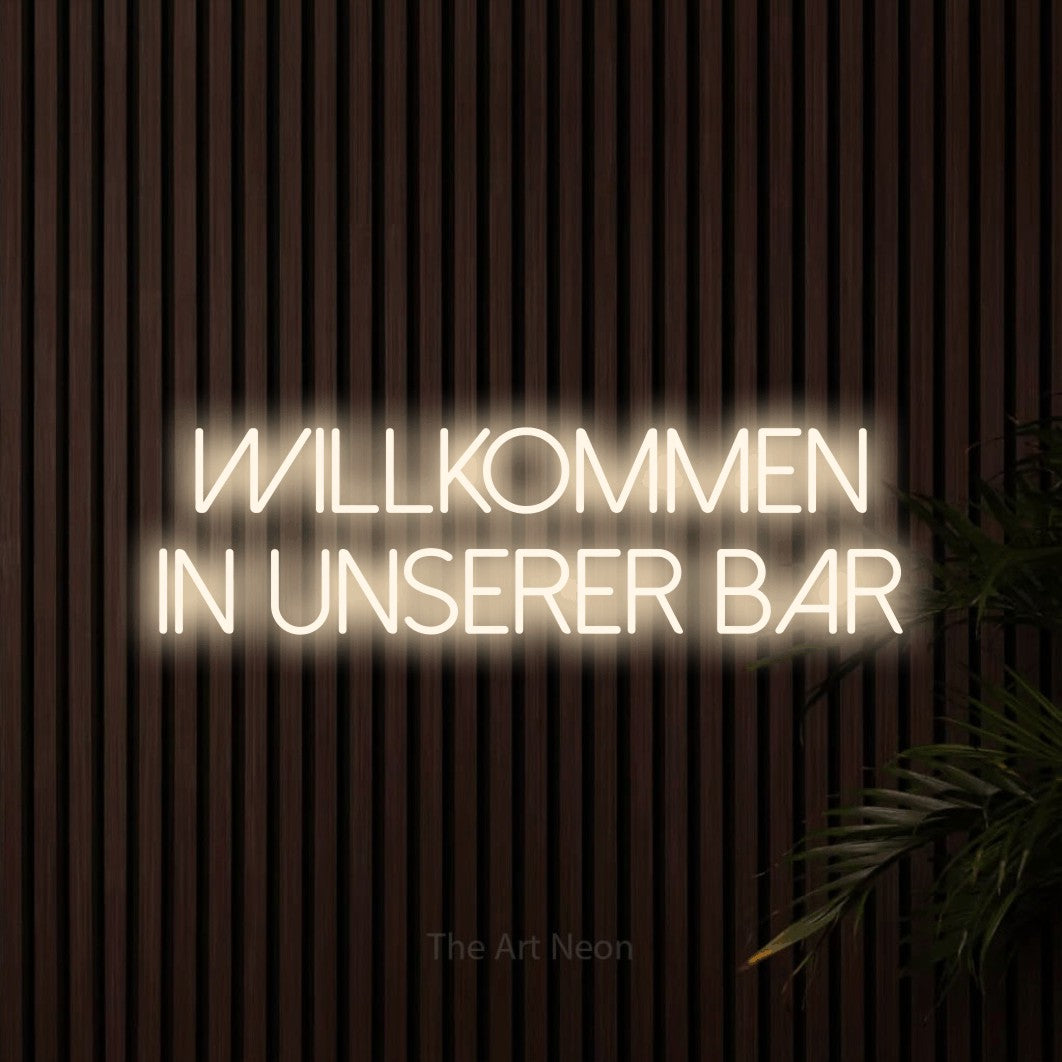 LED neon sign reading “Willkommen in unserer Bar”, arranged in 2 lines.