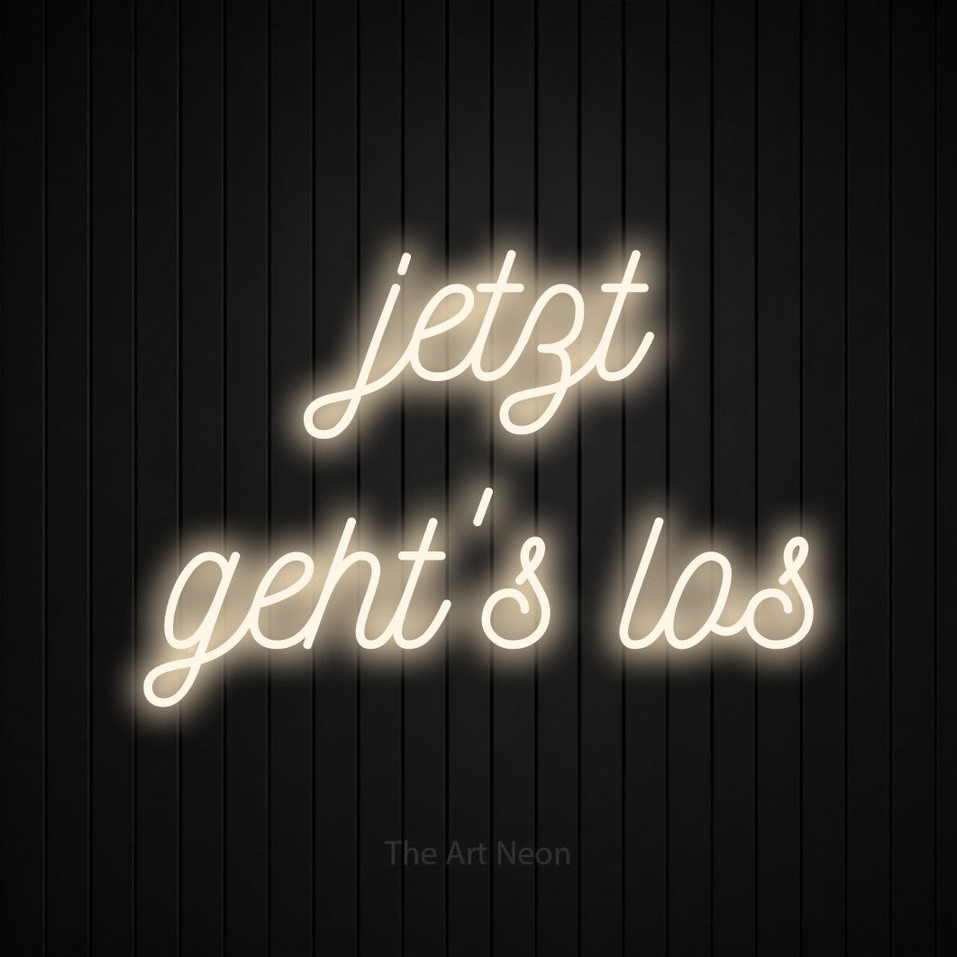 LED neon sign reading “jetzt geht's los”, arranged in 2 lines.